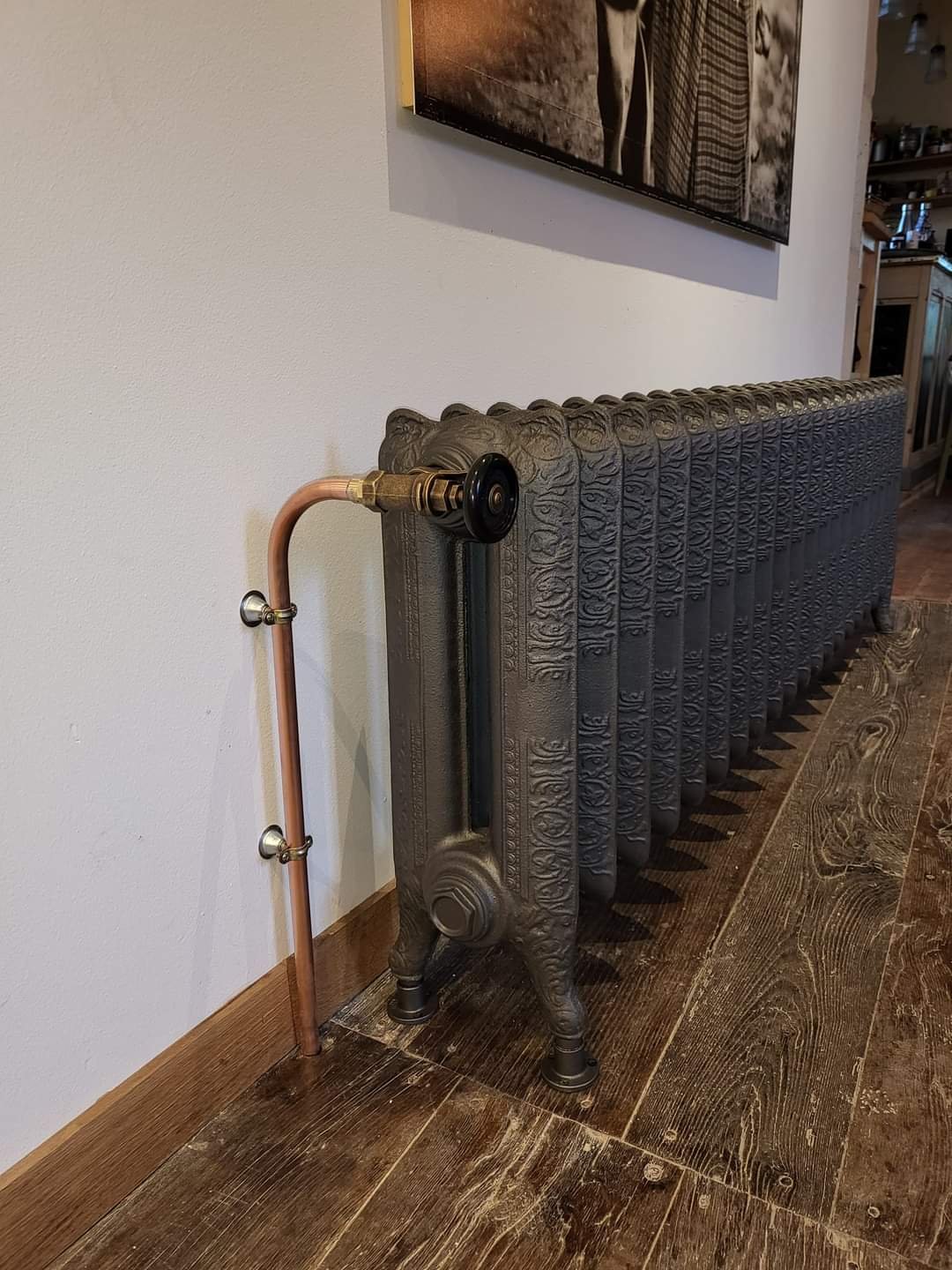 reprise de réseau de chauffage et pose de radiateur en fonte fleurie
